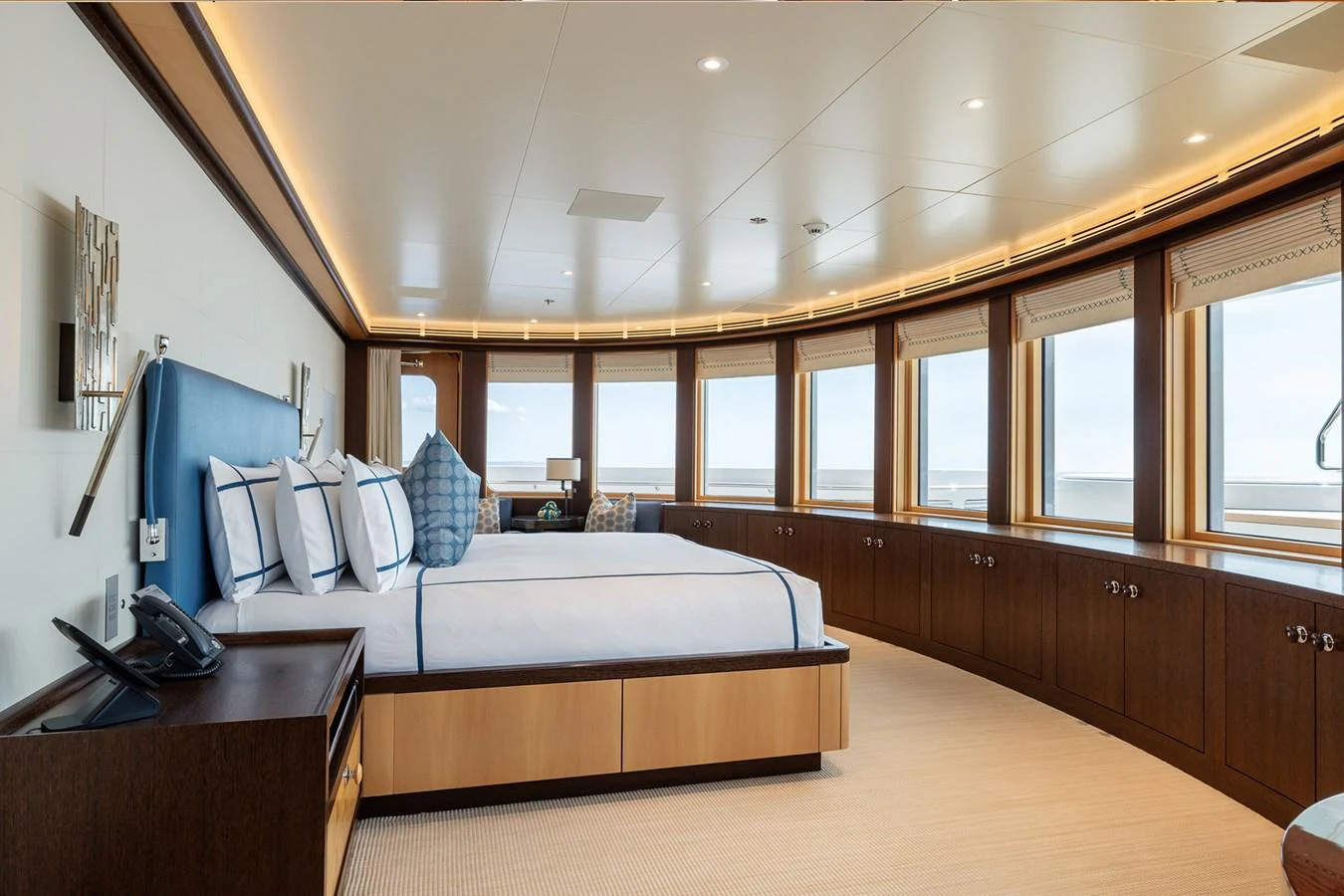 a room with a bed and a desk aboard ROCINANTE Yacht for Sale