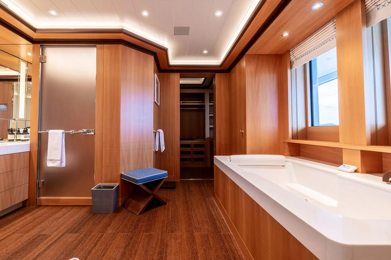 a bathroom with a tub and a sink aboard ROCINANTE Yacht for Sale
