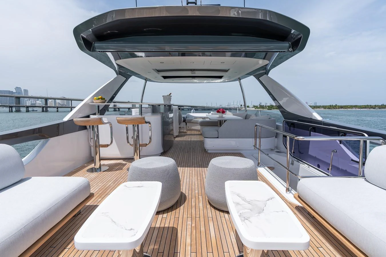 The spacious flybridge offers elegant seating and stunning views over the water. aboard EUPHORIA Yacht for Sale