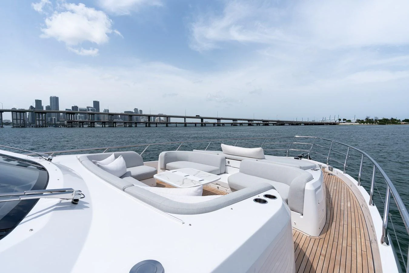 The foredeck features a spacious seating area with plush cushions, perfect for enjoying the view. aboard EUPHORIA Yacht for Sale