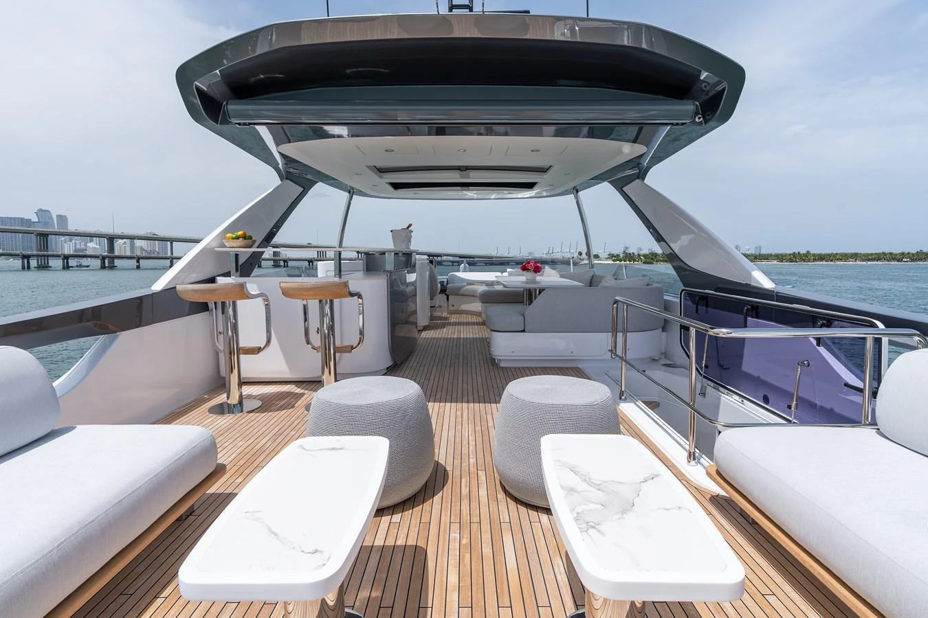 The flybridge offers a spacious and luxurious outdoor living area with ample seating and modern amenities. aboard EUPHORIA Yacht for Sale