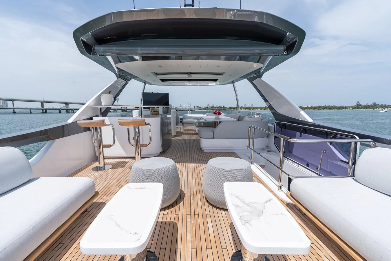 The flybridge offers a spacious and luxurious outdoor living area with ample seating and modern amenities. aboard EUPHORIA Yacht for Sale