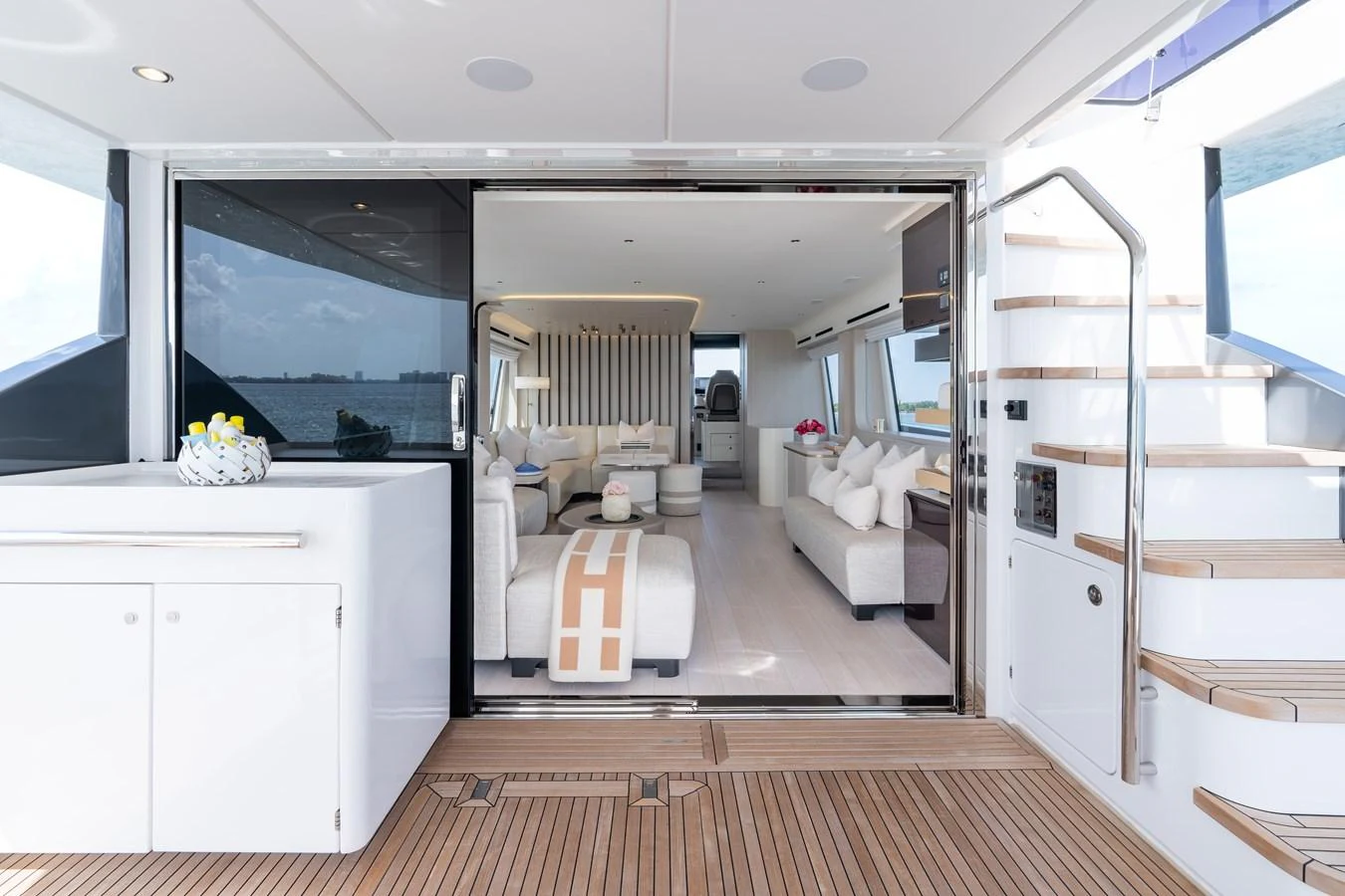 The yacht's salon offers a spacious and elegantly designed living area with ample natural light. aboard EUPHORIA Yacht for Sale