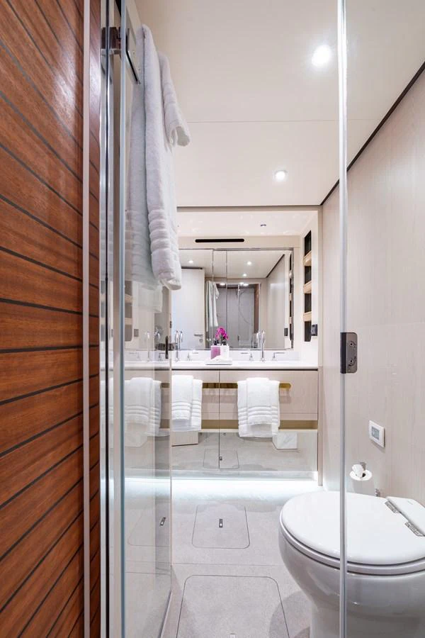 The yacht's bathroom features modern fixtures and a clean, elegant design. aboard EUPHORIA Yacht for Sale