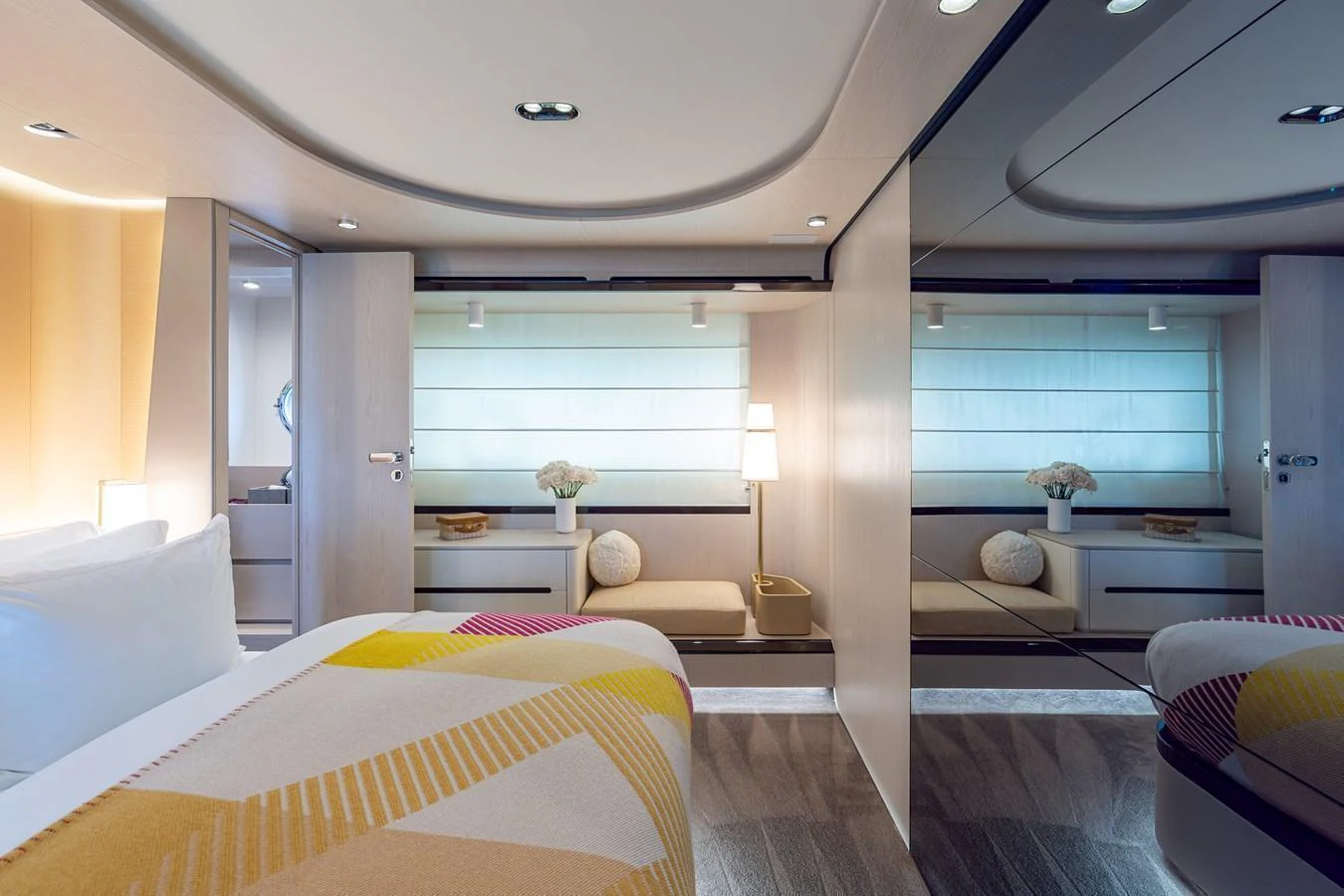 A luxurious stateroom featuring modern decor and soft lighting. aboard EUPHORIA Yacht for Sale