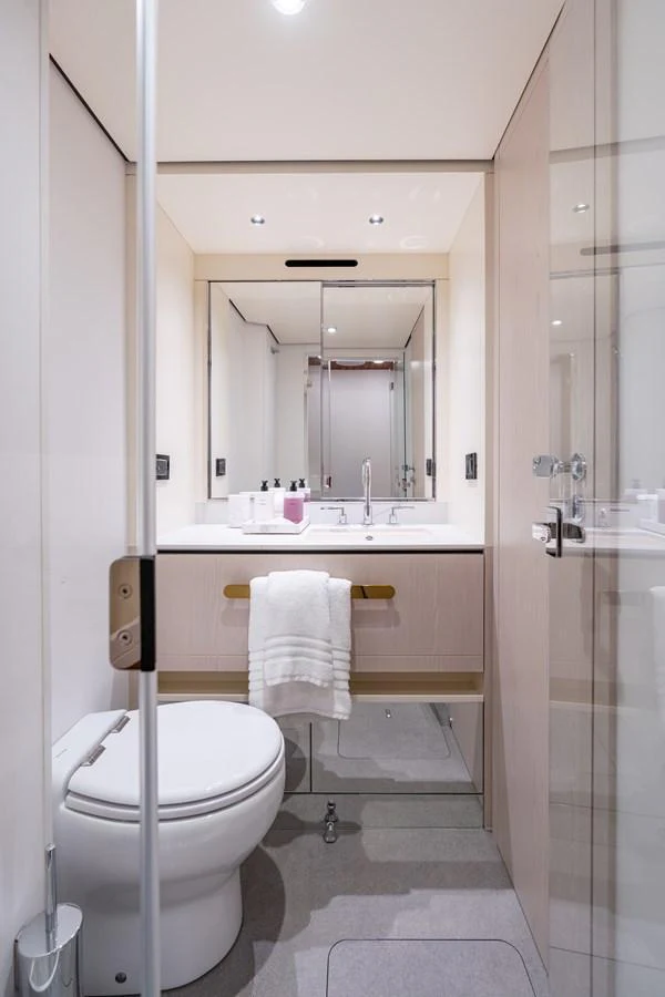 A sleek and modern yacht bathroom with a clean design and elegant fixtures. aboard EUPHORIA Yacht for Sale