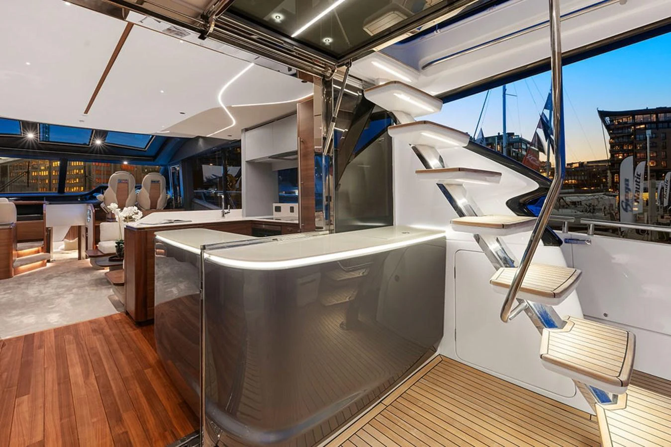 The modern salon features sleek design elements and ample natural light. aboard PRINCESS S72 Yacht for Sale