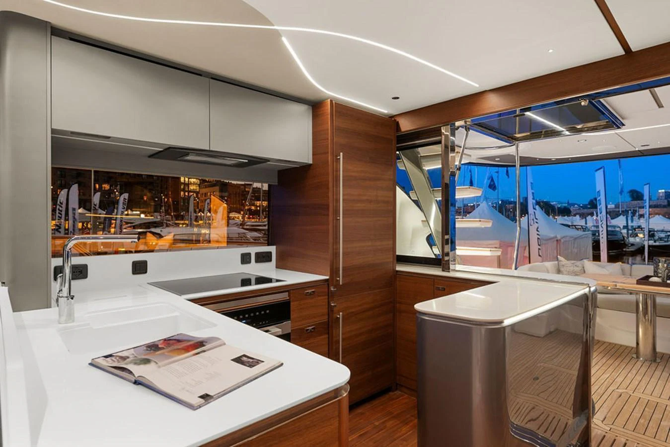 The galley features modern appliances and sleek design, seamlessly blending with the yacht's luxurious interior. aboard PRINCESS S72 Yacht for Sale