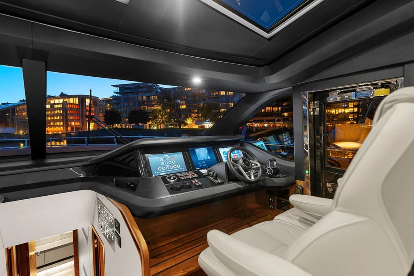 The helm station offers a sophisticated and modern control area with panoramic views. aboard PRINCESS S72 Yacht for Sale