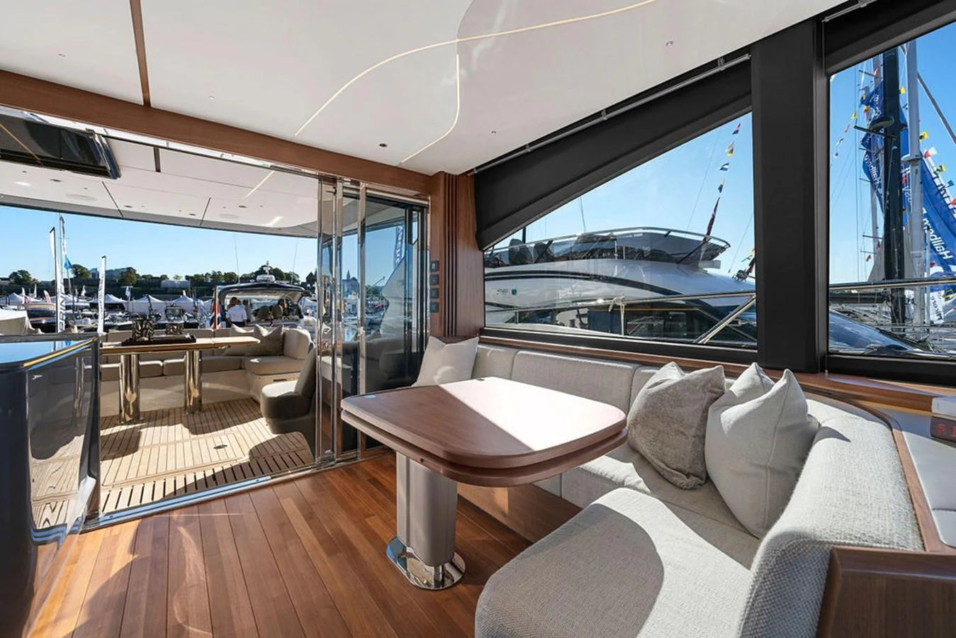 The salon offers a spacious and stylish area with comfortable seating and ample natural light. aboard PRINCESS S72 Yacht for Sale