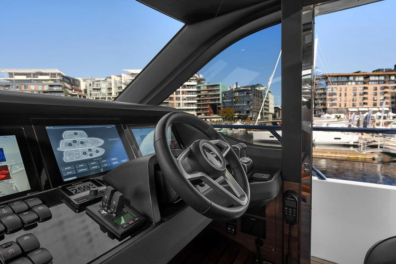 The helm station offers a modern and sophisticated control area with advanced navigation systems. aboard PRINCESS S72 Yacht for Sale