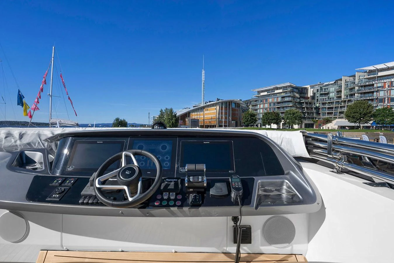The helm station offers a modern and well-equipped control area with a clear view of the surroundings. aboard PRINCESS S72 Yacht for Sale