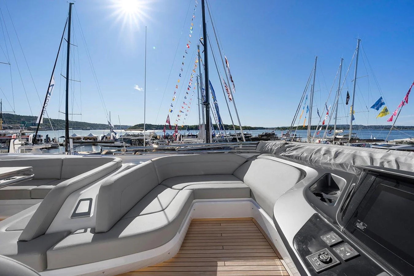 The flybridge offers ample seating with a stunning view of the marina. aboard PRINCESS S72 Yacht for Sale