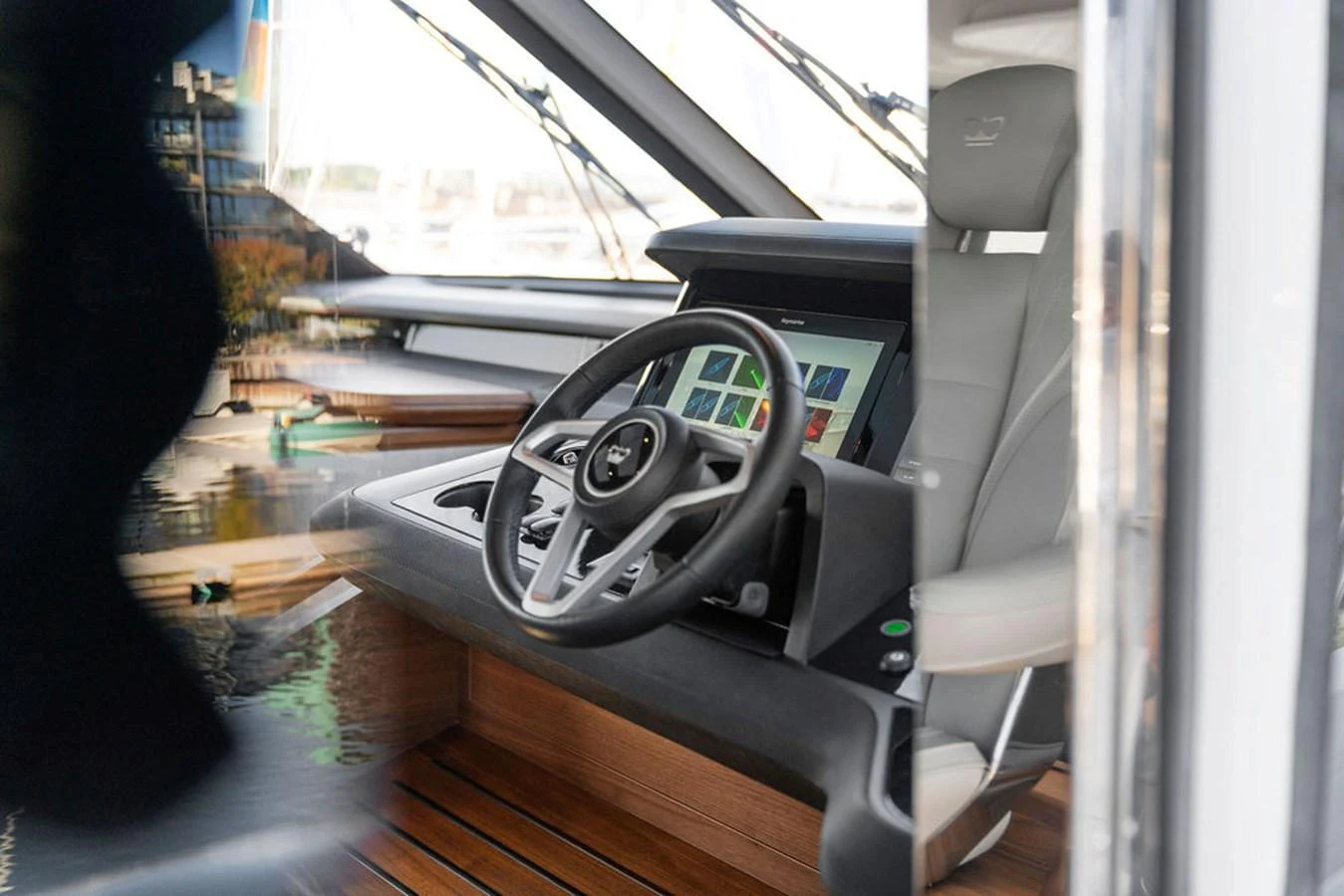 The helm station features modern navigation equipment and a sleek design. aboard PRINCESS S72 Yacht for Sale