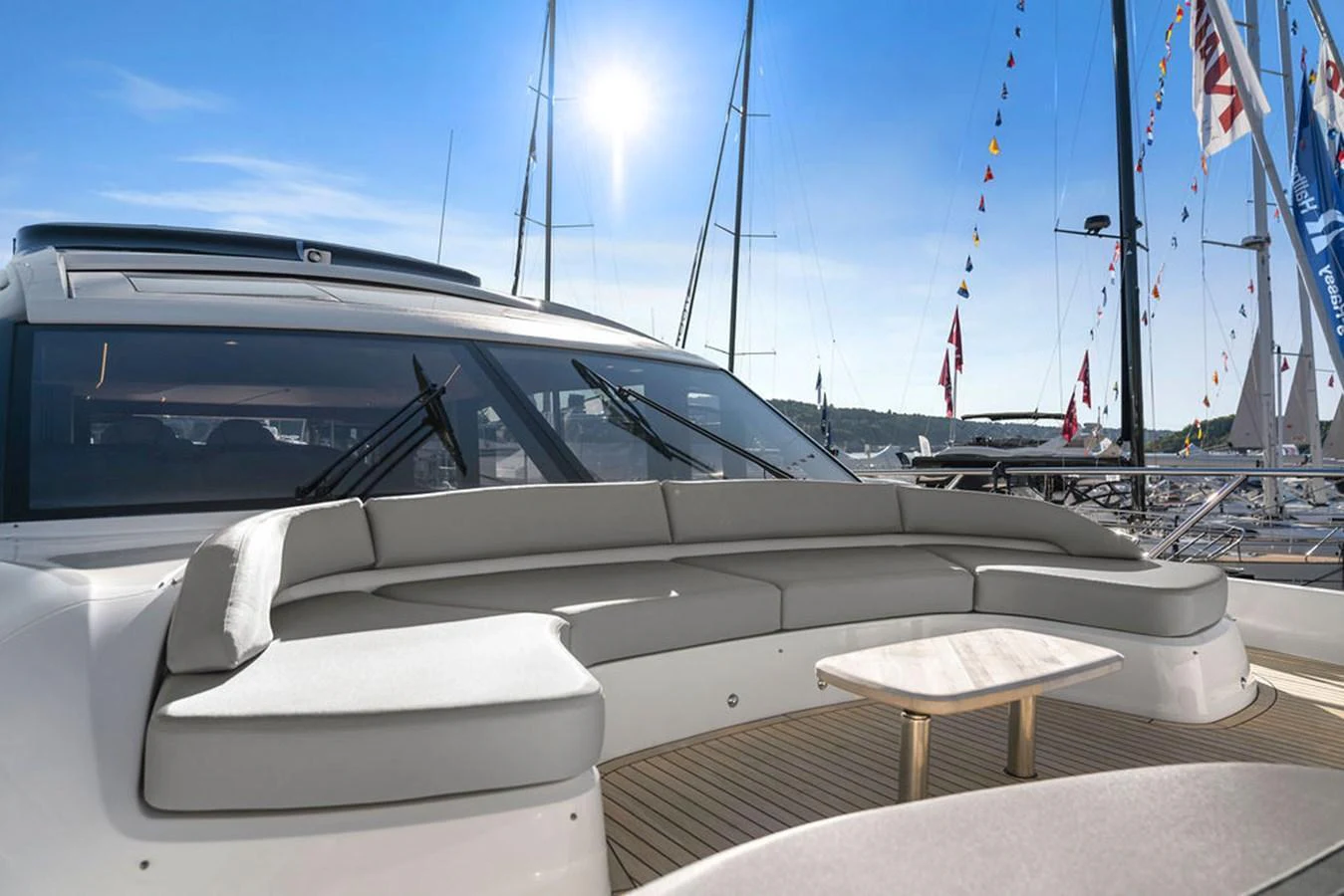 The aft deck features a spacious and stylish seating area with a modern design. aboard PRINCESS S72 Yacht for Sale