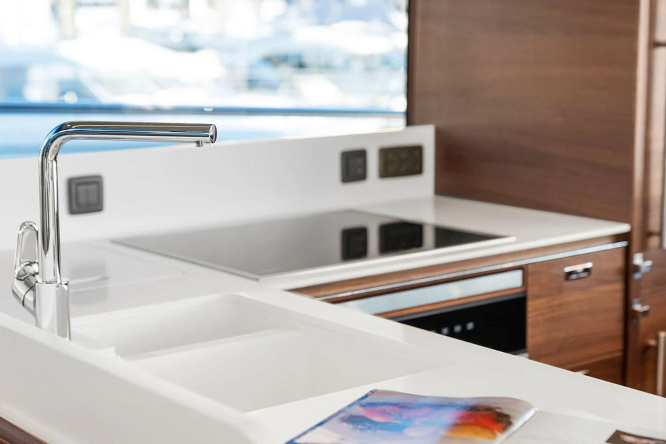 The yacht's galley features modern appliances and sleek design elements. aboard PRINCESS S72 Yacht for Sale