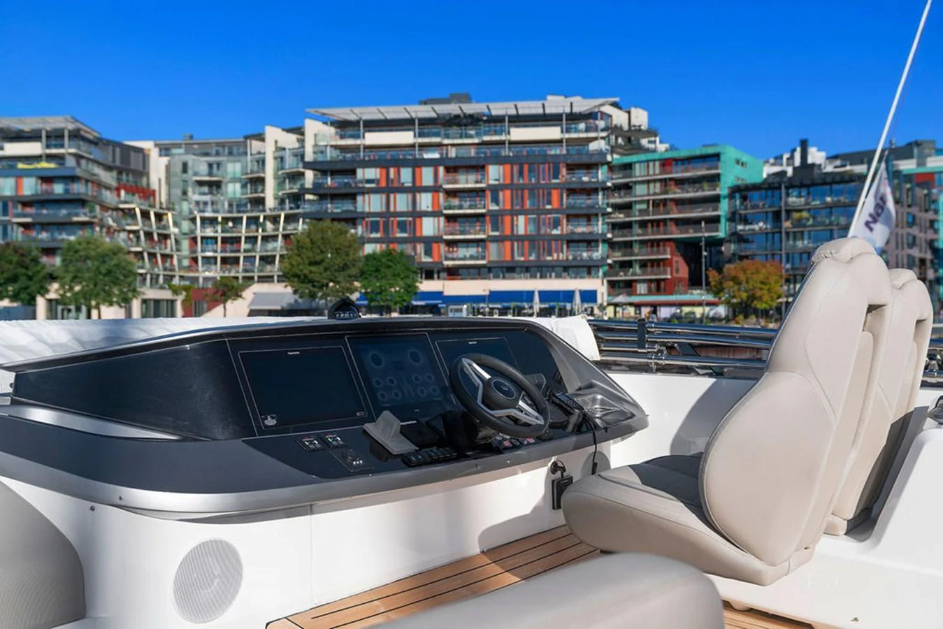 The helm station offers a modern and sleek design with advanced navigation equipment and comfortable seating. aboard PRINCESS S72 Yacht for Sale