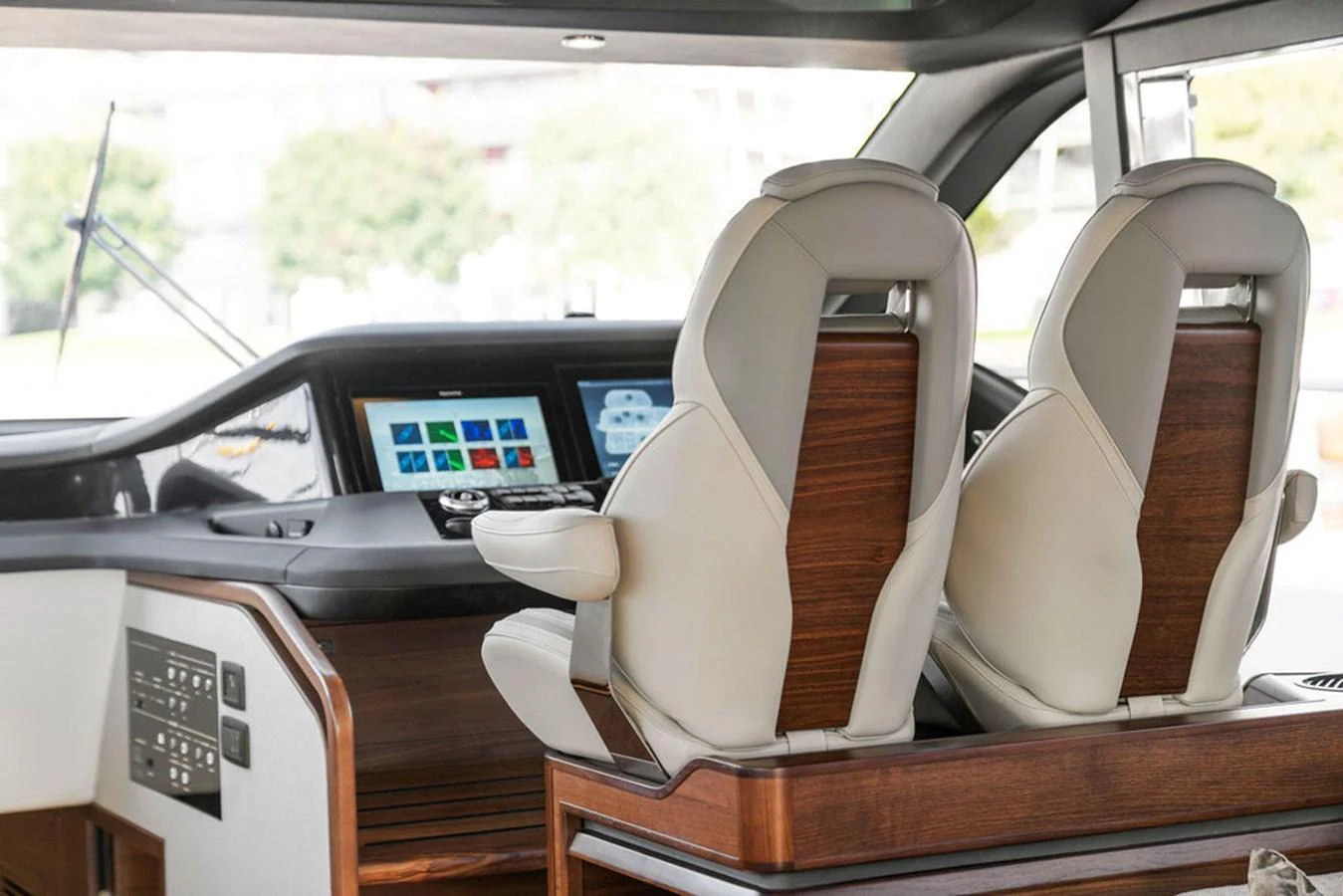 The helm station features modern navigation equipment and luxurious seating. aboard PRINCESS S72 Yacht for Sale