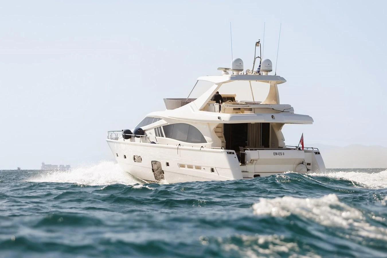 A sleek yacht cruises through the water, showcasing its elegant design and luxurious amenities. aboard M/Y EM- II Yacht for Sale