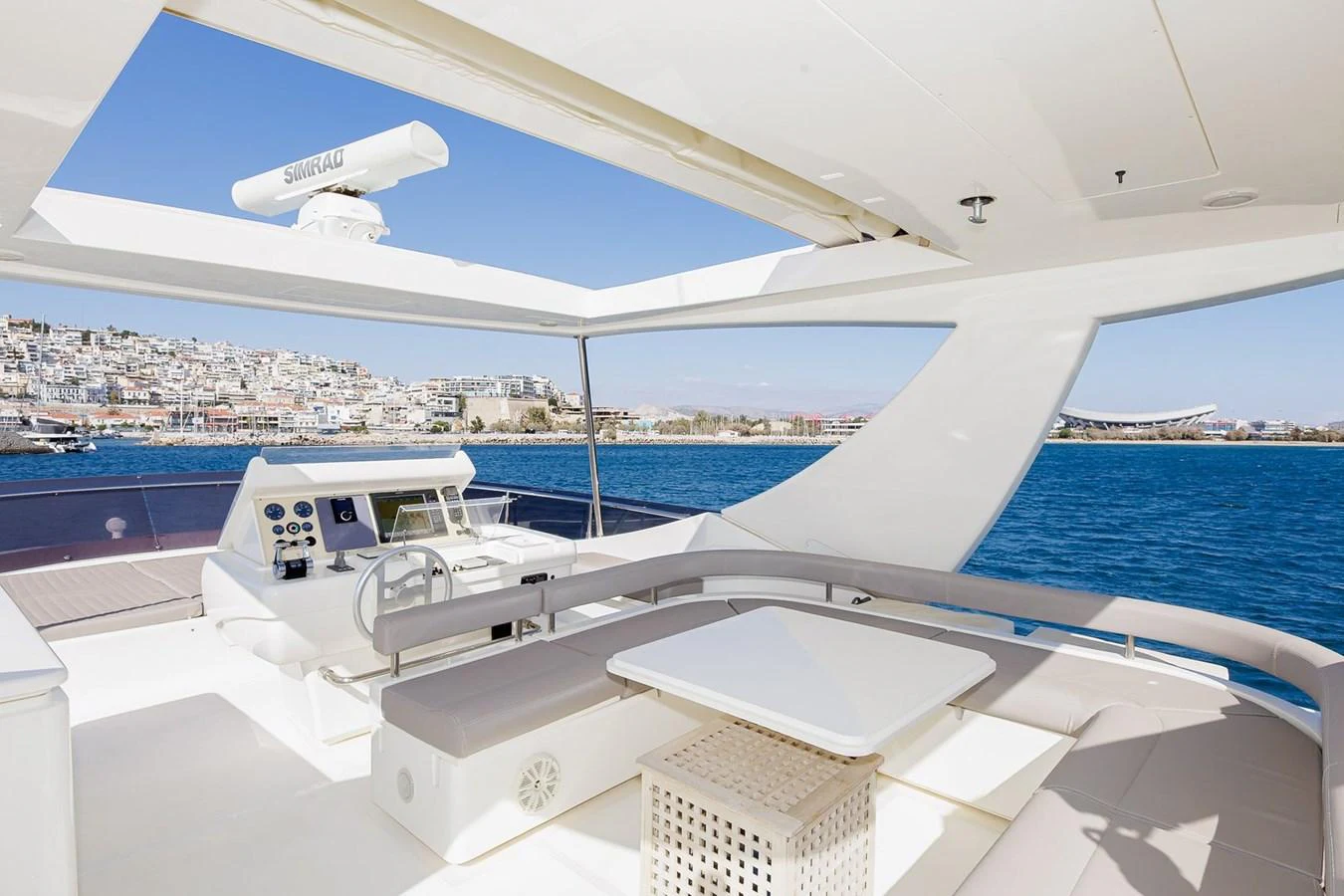 The flybridge offers a spacious and luxurious outdoor seating area with stunning views of the water and surrounding landscape. aboard M/Y EM- II Yacht for Sale