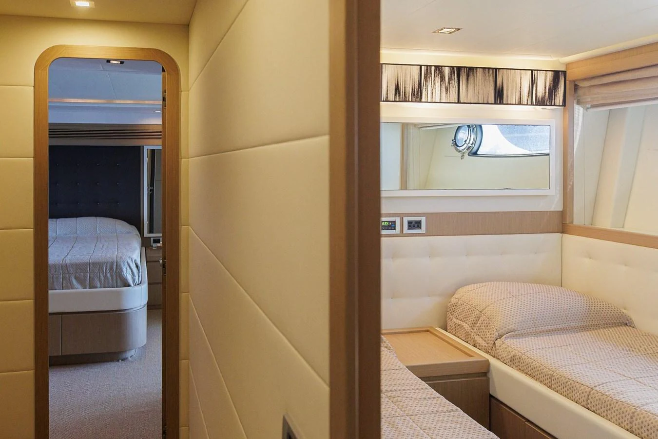 The image showcases the cozy and well-appointed staterooms of the yacht, featuring comfortable beds and modern decor. aboard M/Y EM- II Yacht for Sale