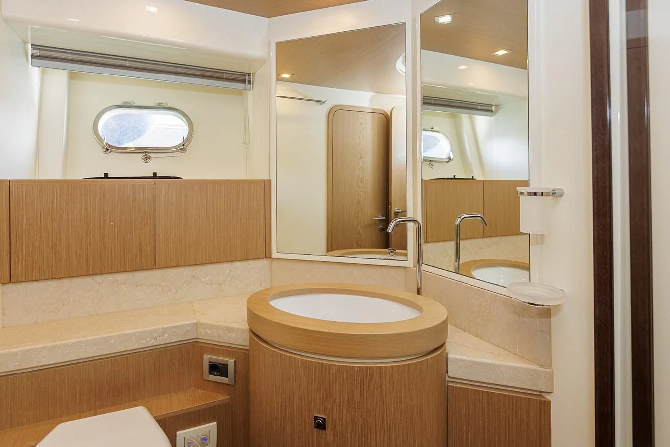 The yacht's bathroom features modern fixtures and a clean, elegant design. aboard M/Y EM- II Yacht for Sale
