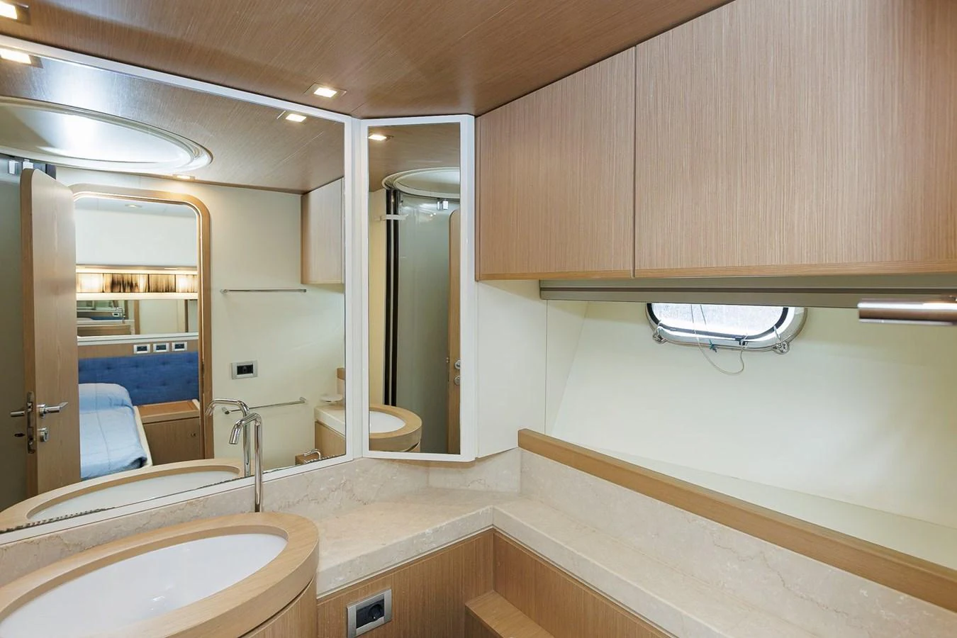The yacht's bathroom features modern fixtures and a sleek design with ample natural light. aboard M/Y EM- II Yacht for Sale