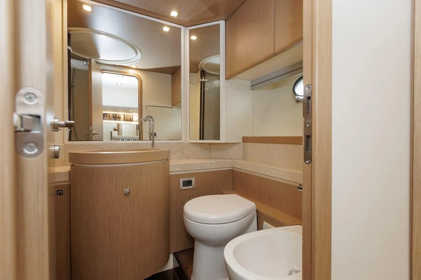 The yacht's bathroom features modern fixtures and a sleek design. aboard M/Y EM- II Yacht for Sale