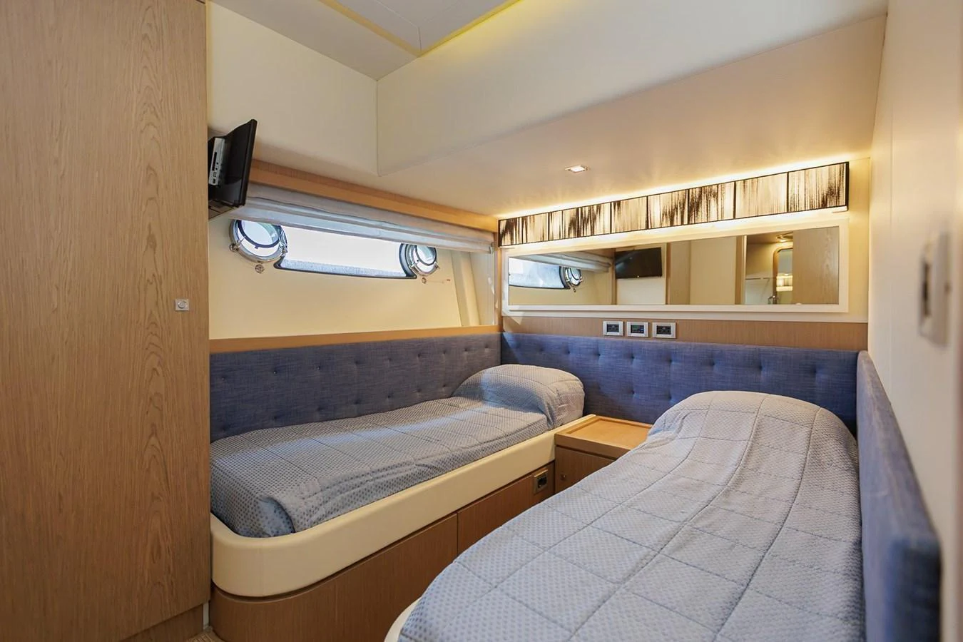 The twin stateroom offers a cozy and comfortable sleeping area with modern amenities. aboard M/Y EM- II Yacht for Sale