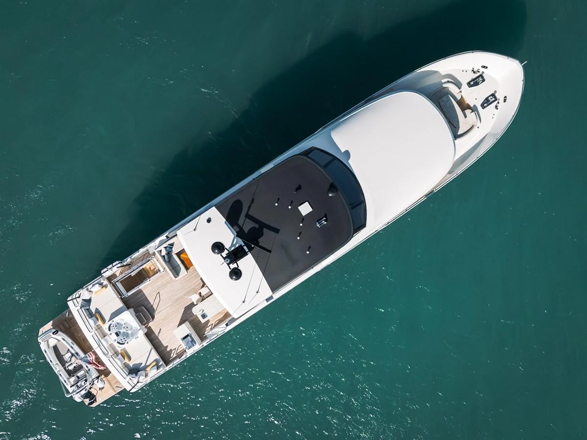 Aerial view of a sleek yacht cruising through calm waters. aboard LA LA LA Yacht for Sale