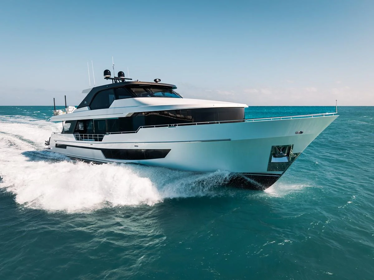 A sleek and modern yacht cruising through the open sea, showcasing its elegant design and powerful performance. aboard LA LA LA Yacht for Sale