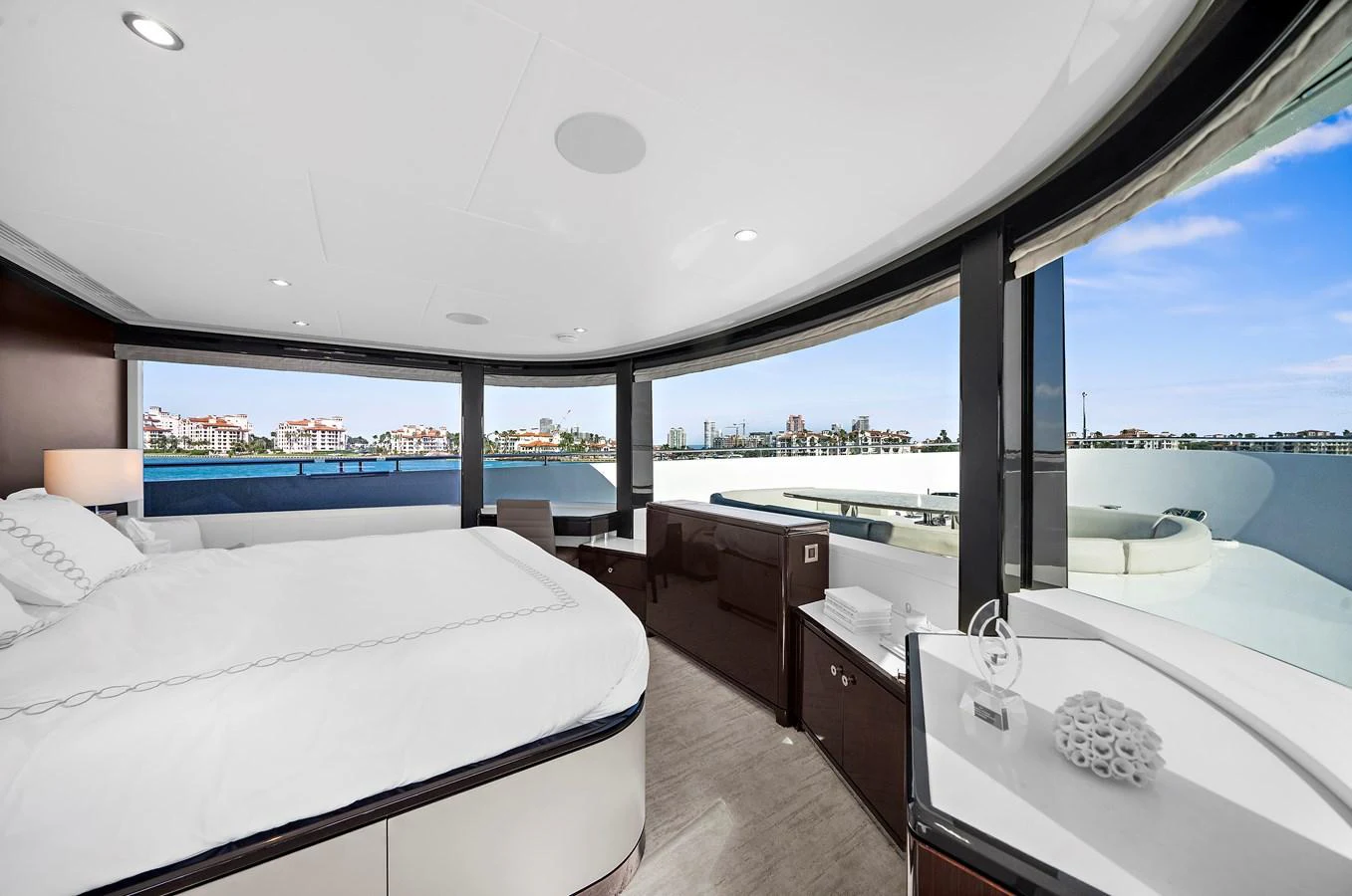 The master stateroom offers panoramic views and luxurious comfort with modern furnishings. aboard LA LA LA Yacht for Sale