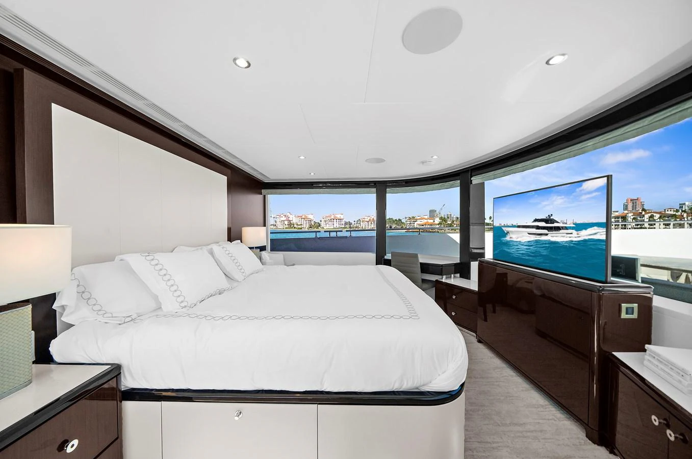 The master stateroom offers a luxurious and spacious retreat with panoramic views and modern amenities. aboard LA LA LA Yacht for Sale
