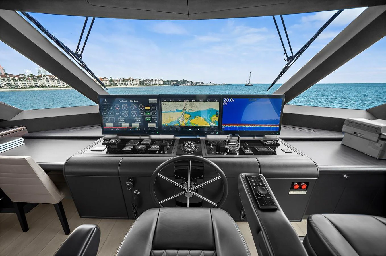 The helm station offers a commanding view with state-of-the-art navigation equipment and luxurious seating. aboard LA LA LA Yacht for Sale