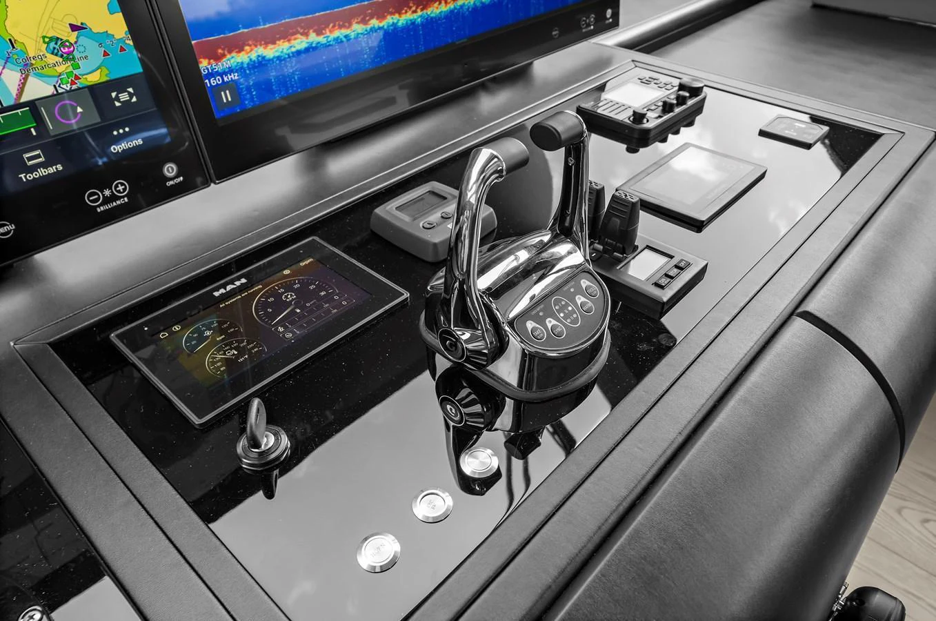 The helm station features advanced navigation and control systems with sleek, modern design. aboard LA LA LA Yacht for Sale