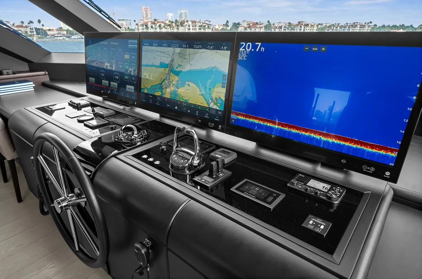 The helm station features advanced navigation and control systems with multiple large displays. aboard LA LA LA Yacht for Sale
