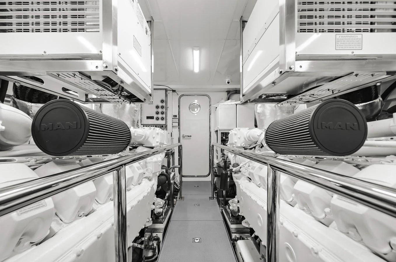 The engine room showcases powerful and meticulously maintained machinery. aboard LA LA LA Yacht for Sale
