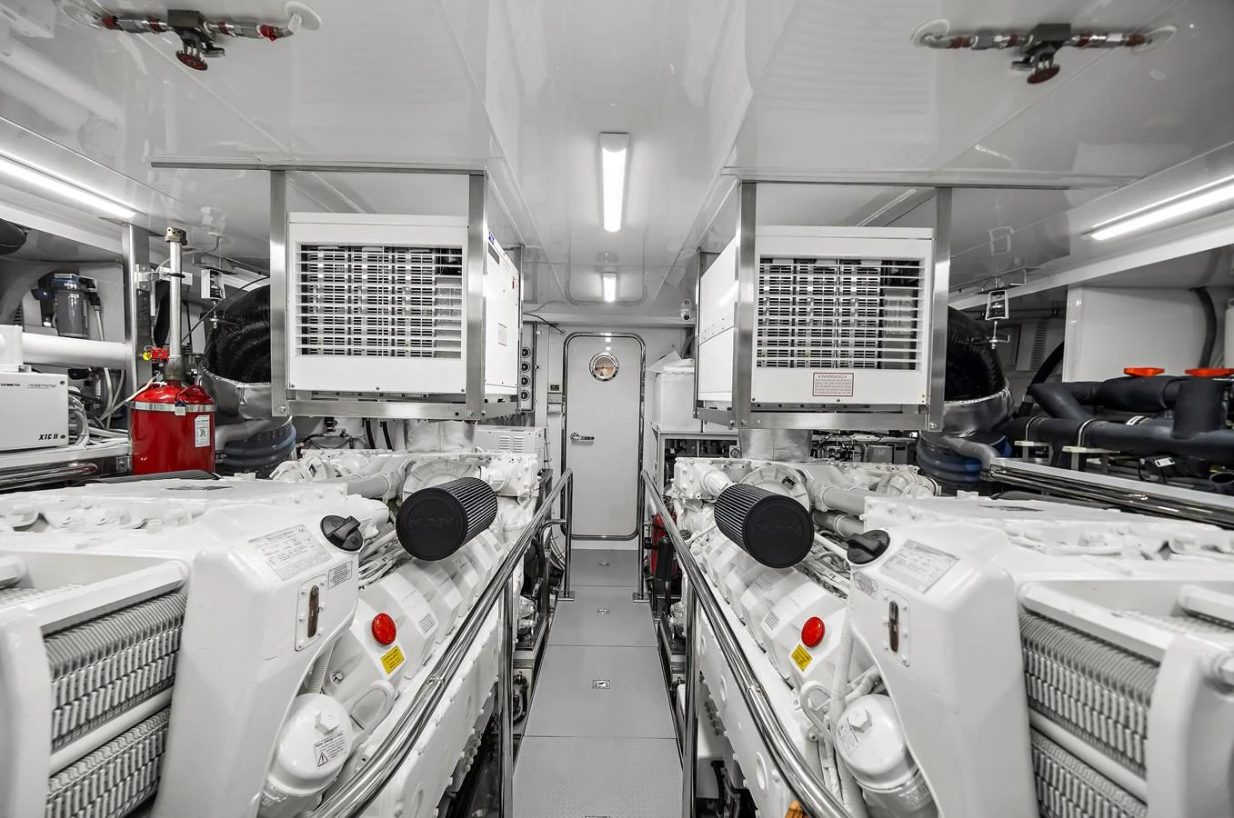 The engine room showcases the yacht's powerful and meticulously maintained machinery. aboard LA LA LA Yacht for Sale