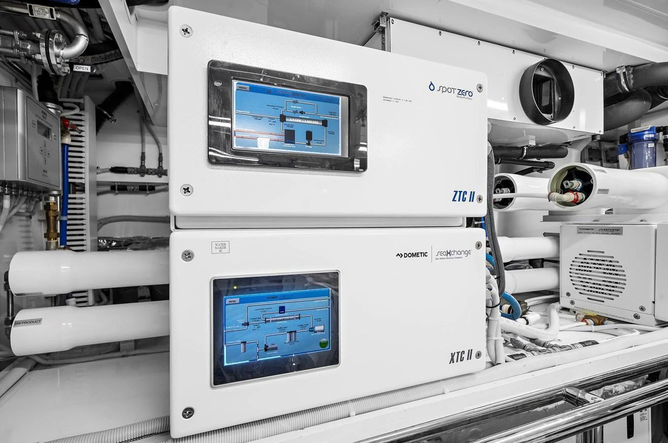 The image showcases the technical equipment and control panels in the yacht's engine room. aboard LA LA LA Yacht for Sale
