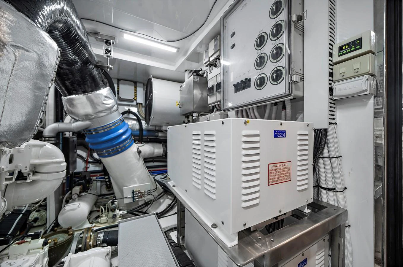 The image showcases the yacht's well-organized engine room with advanced machinery and control panels. aboard LA LA LA Yacht for Sale