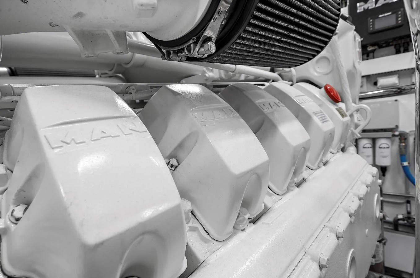 A close-up view of the yacht's powerful engine components. aboard LA LA LA Yacht for Sale