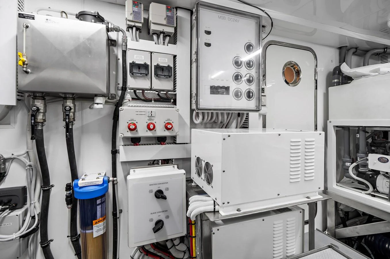 The image showcases the well-organized and clean engine room of the yacht, highlighting its advanced technical equipment. aboard LA LA LA Yacht for Sale