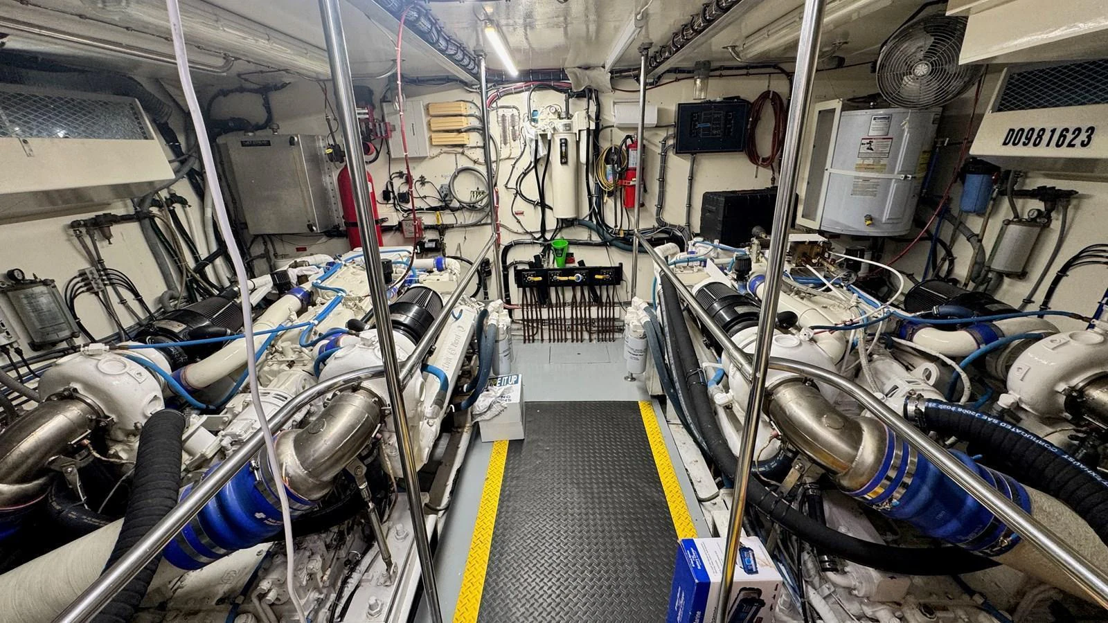 The engine room showcases the yacht's powerful and well-maintained machinery. aboard TOP GUN Yacht for Sale