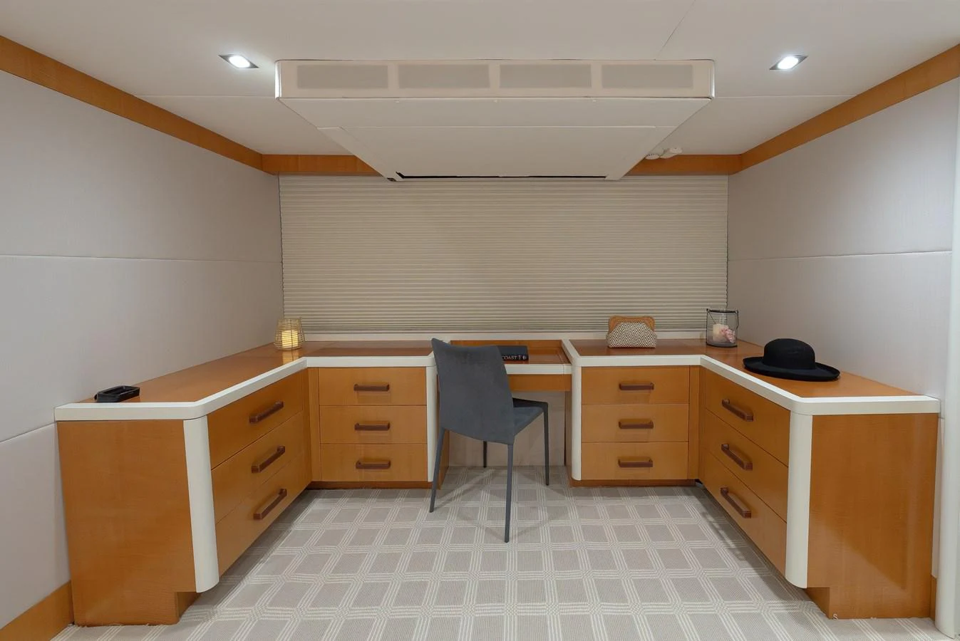 A well-appointed office space with ample storage and modern furnishings. aboard WHISTLE Yacht for Sale