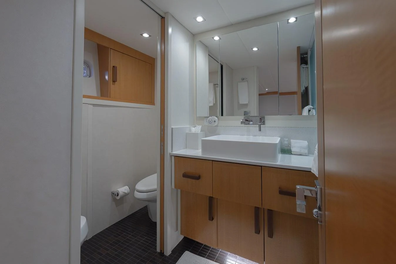 The yacht's bathroom features modern fixtures and a sleek design. aboard WHISTLE Yacht for Sale