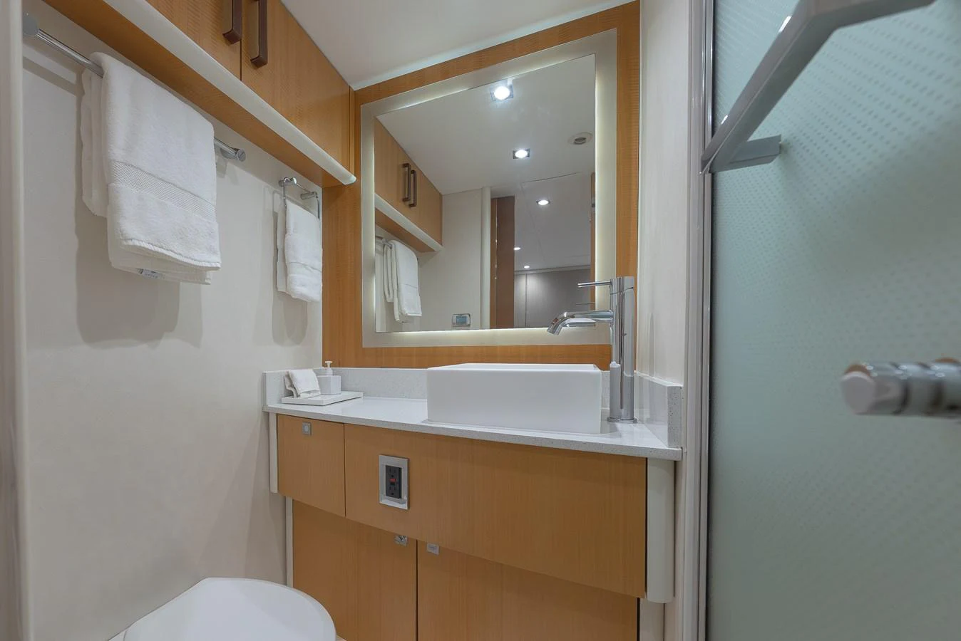 The yacht's bathroom features modern fixtures and a clean, minimalist design. aboard WHISTLE Yacht for Sale