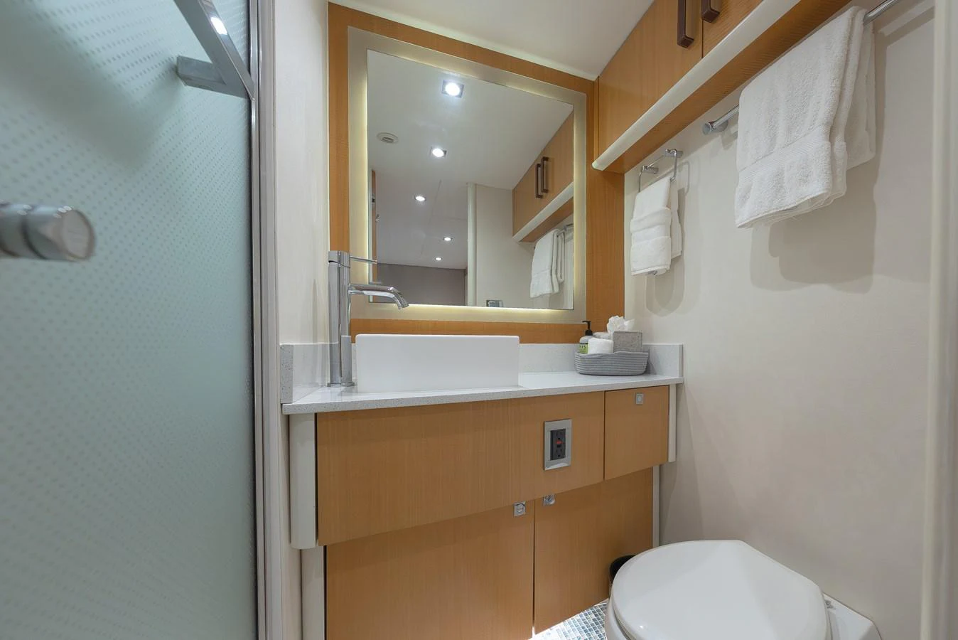 The yacht's bathroom features modern fixtures and a clean, minimalist design. aboard WHISTLE Yacht for Sale