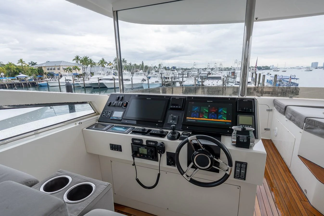 The helm station offers a commanding view of the marina with state-of-the-art navigation equipment. aboard WHISTLE Yacht for Sale