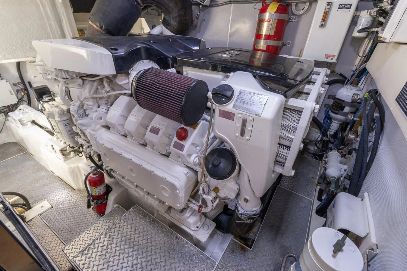 The engine room showcases a powerful and well-maintained engine setup. aboard WHISTLE Yacht for Sale