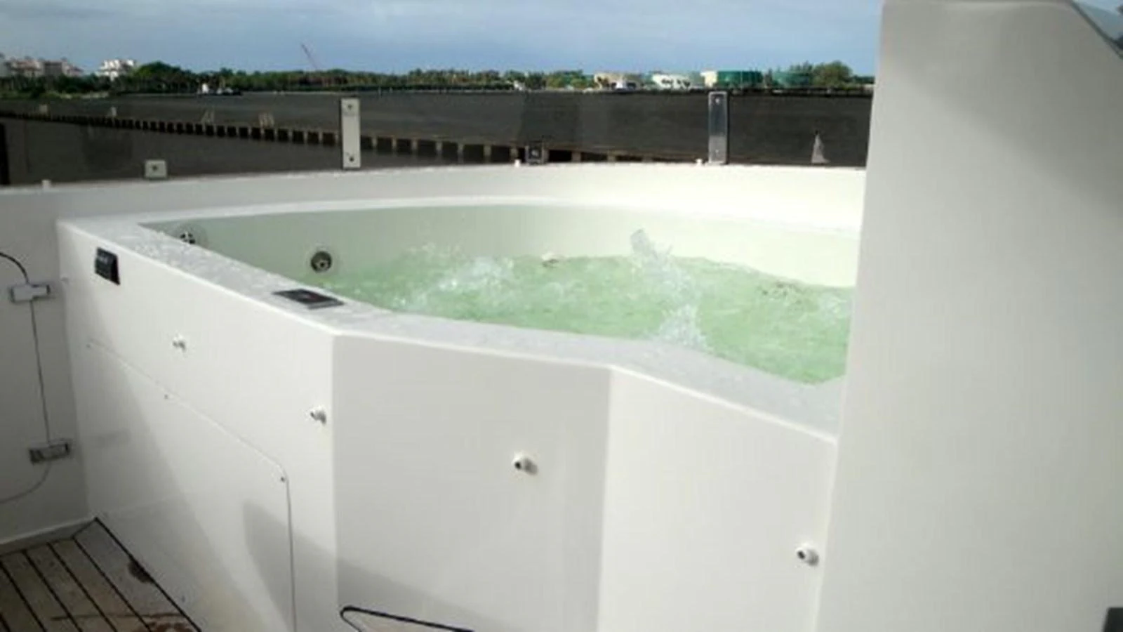 The yacht features a luxurious jacuzzi on the deck, perfect for relaxation. aboard WHISTLE Yacht for Sale